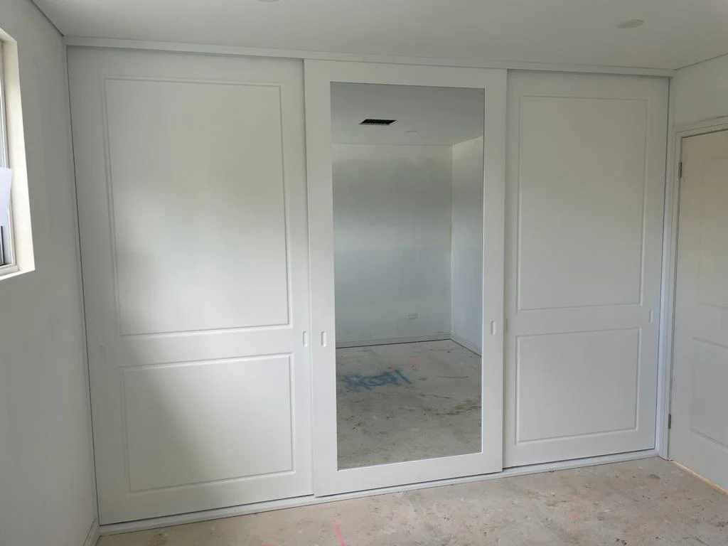 Polyurethane Painted Routered Design With Mirror Wardrobe Sliding Doors Up To 2400mm Height by Trademaster - Image 3